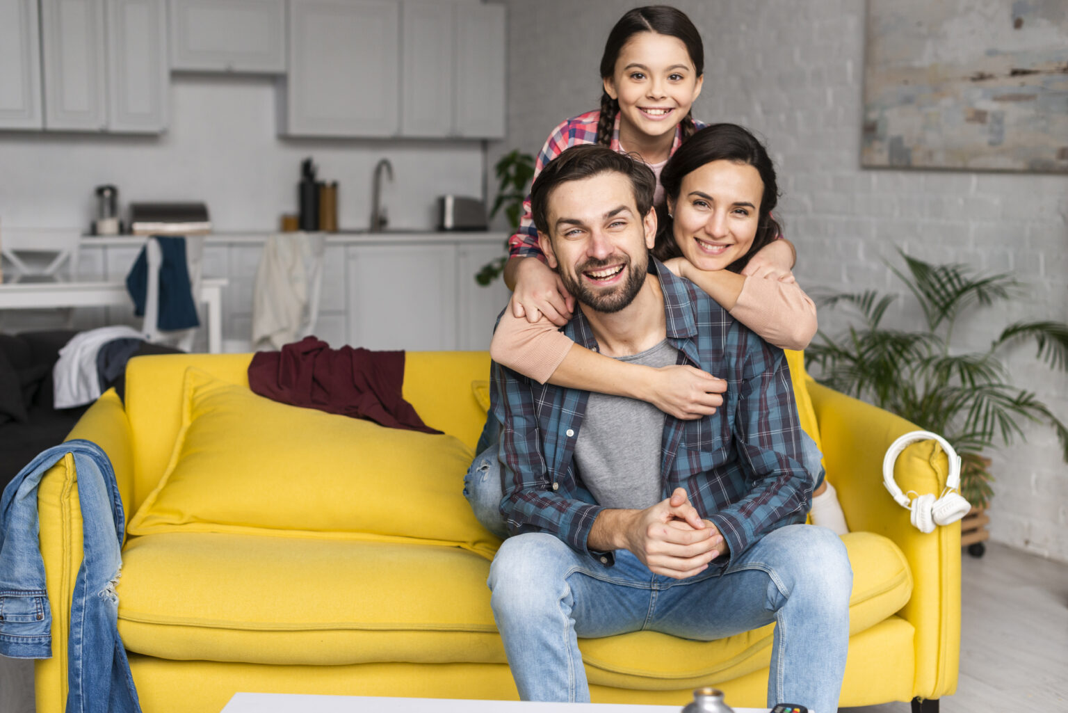 happy-family-pile-dad-sitting-sofa